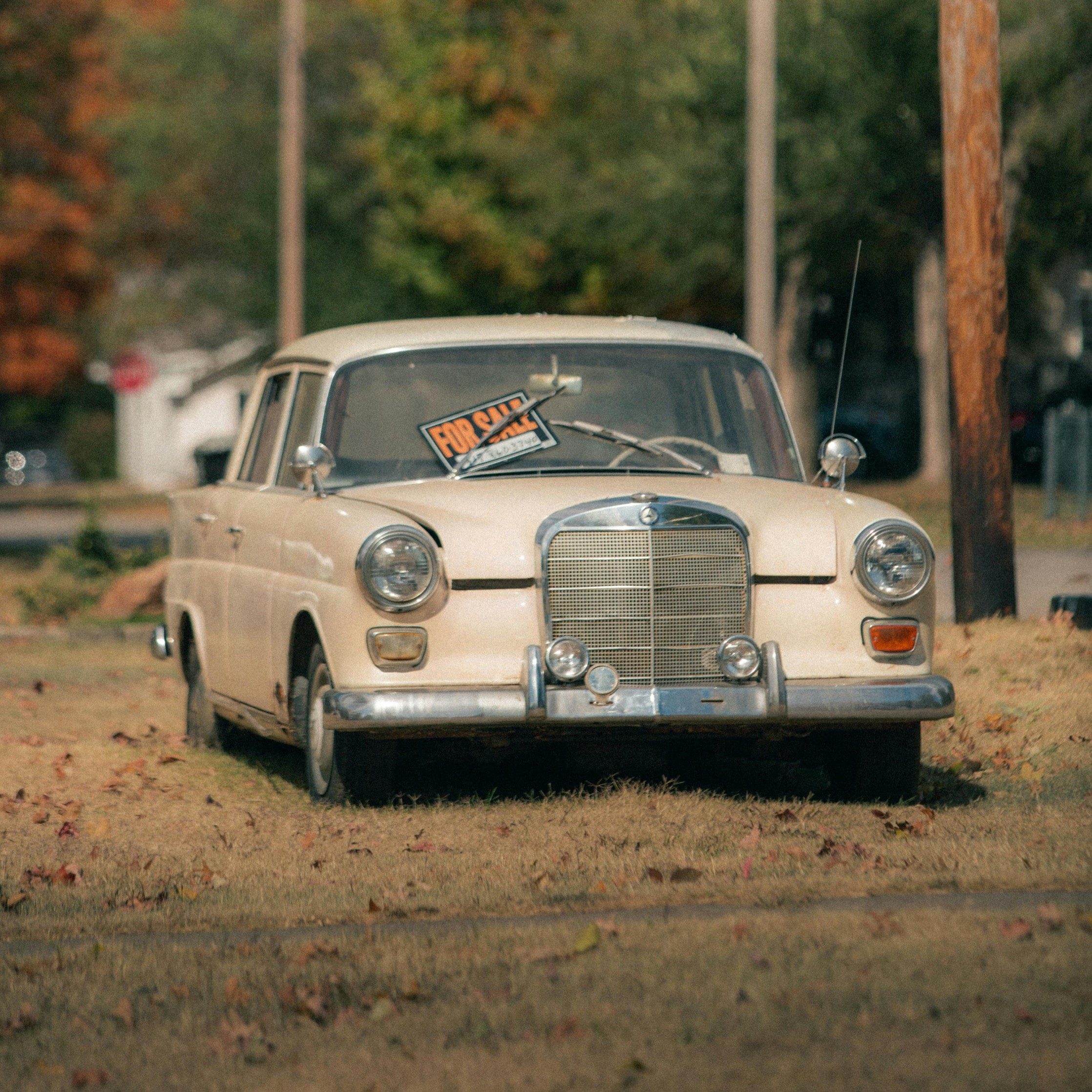 Photo by Yura Forrat: https://www.pexels.com/photo/a-beige-vintage-car-parked-14135610/